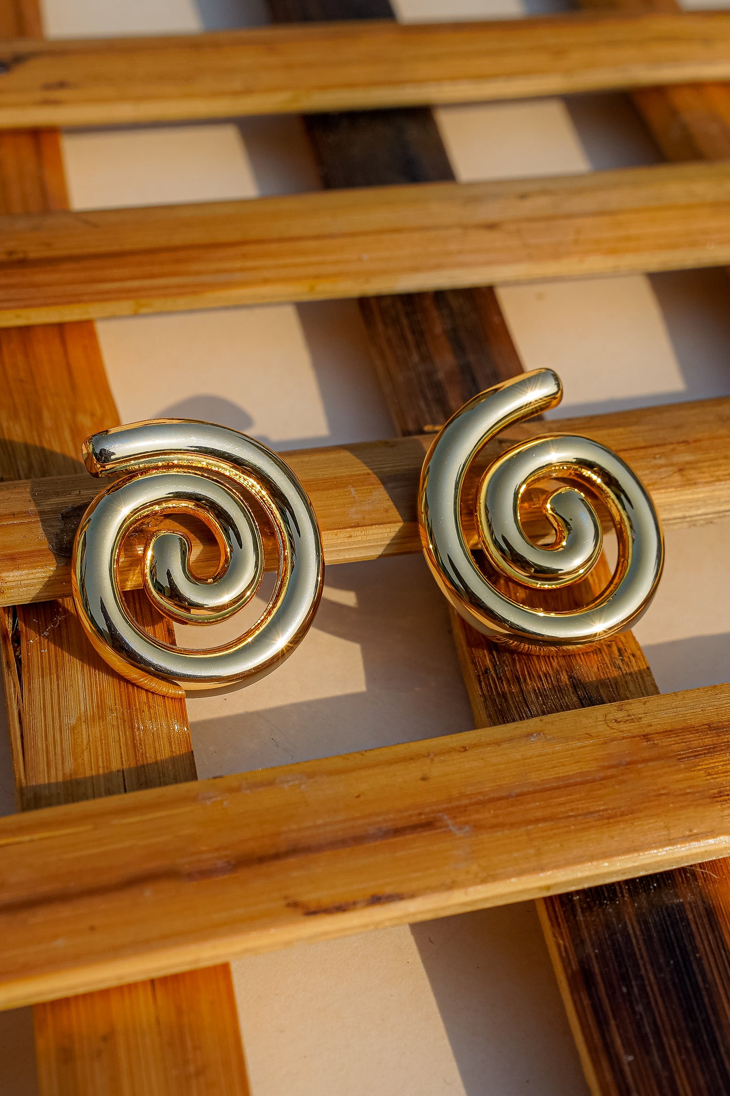 Golden Swirl Statement Studs Earrings